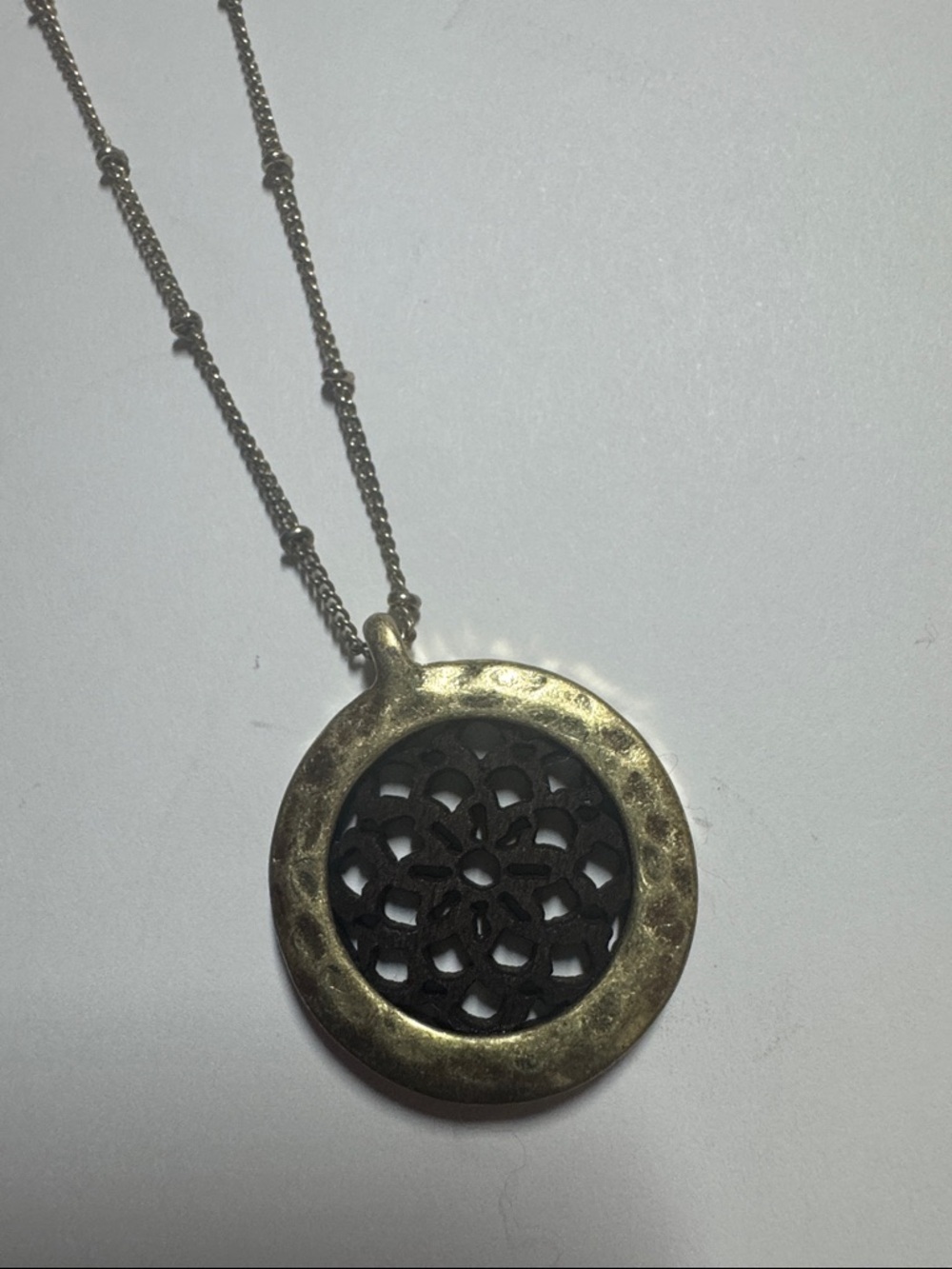 Round Filigree Pendant Necklace in Gold and brown wood -